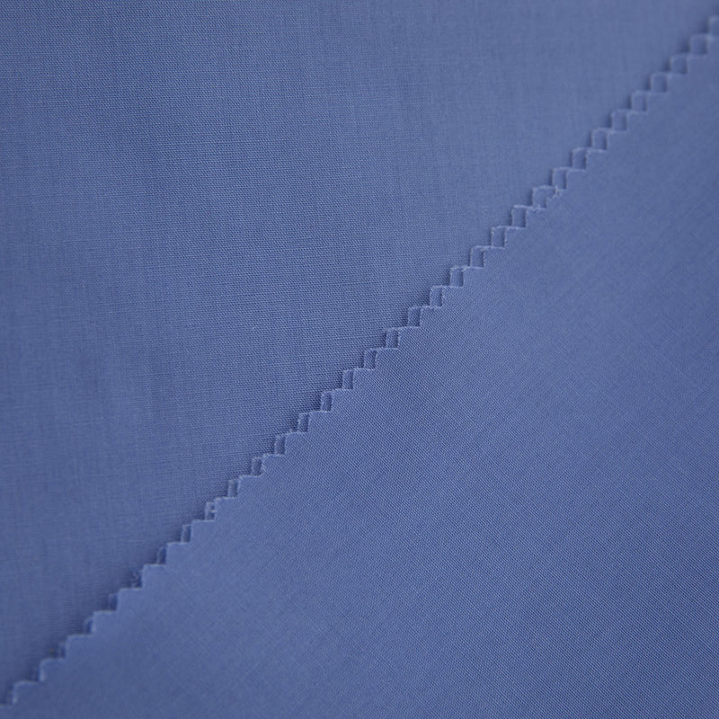    tecido_popeline_para_camisas_110g_para_fardas_algodao_poliester_alta_qualidade_e_conforto_azul_pastel_Texland