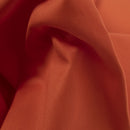     tecido_sarja_260g_resistente_ao_cloro_100__algodao_para_fardas_fardamento_alta_qualidade_e_conforto_laranja_Texland